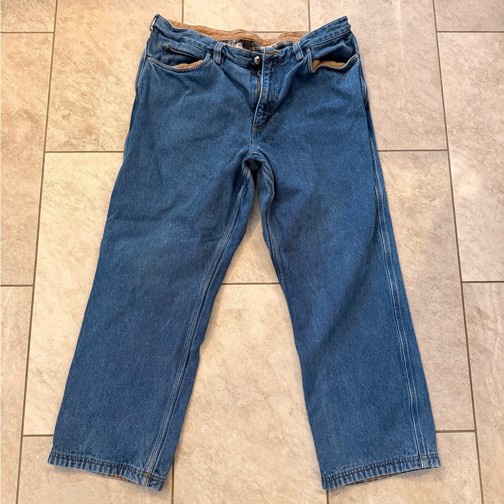 2 pairs Duluth Trading Co Relaxed Fit Blue Jeans, one flannel lined